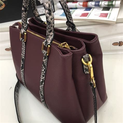 prada handbags where to buy